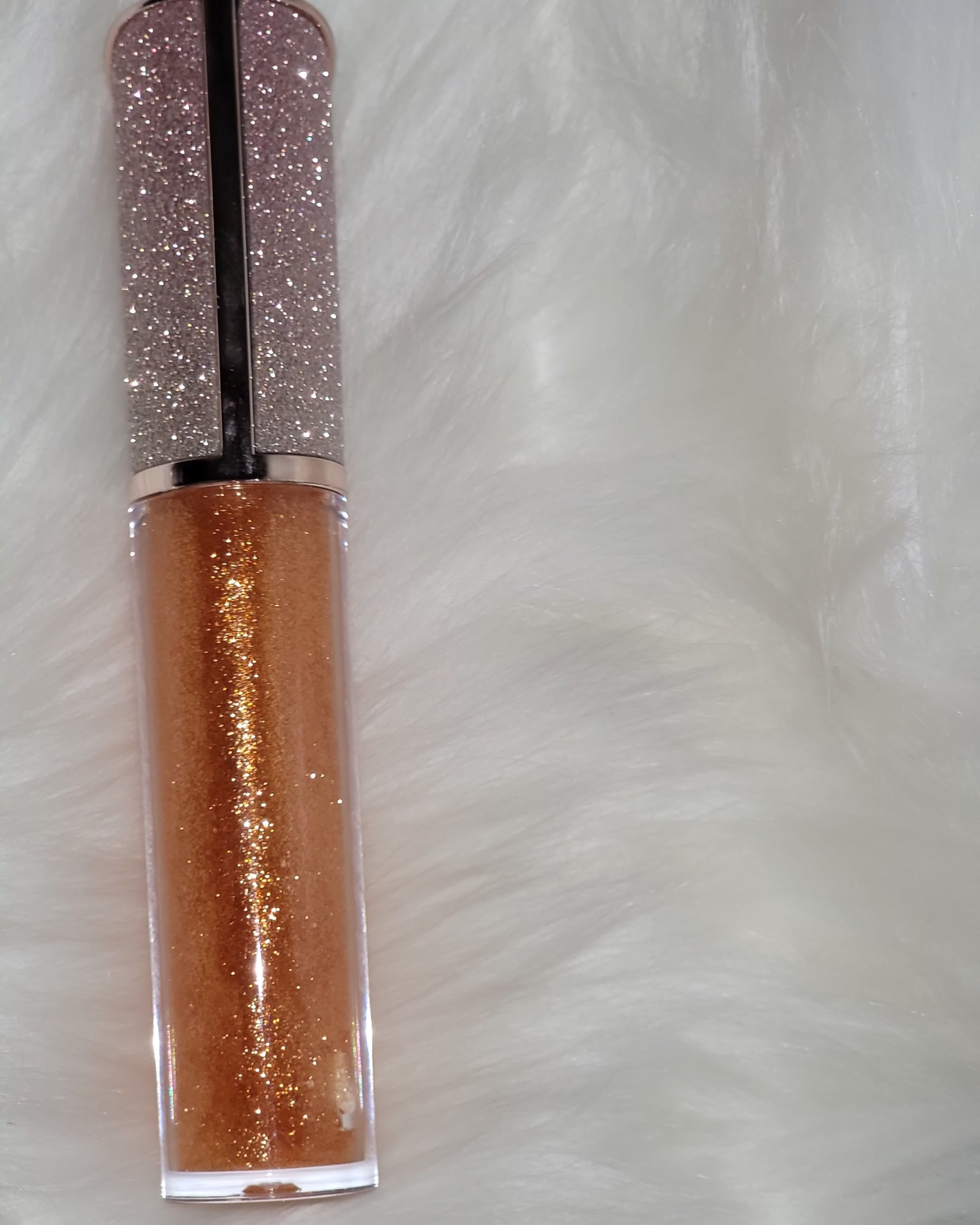 Our lip gloss has a non - sticky, silky smooth application that ssmeels amazing 